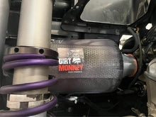 Close-up of Dirt Monkey Can Am X3 performance air filter kit featuring a high-flow air filter designed for enhanced engine performance. Kit includes durable components for optimal filtration and improved airflow, boosting vehicle power and efficiency. 